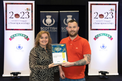 FREE TO USE PHOTOGRAPH..World Haggis Championships 2023.
Daniel West of Mogerleys Butchers in Dumfries pictured receiving his certificate from Louise Harley of sponsors Hamlyns after being named South West of Scotland Champion in the 2023 World Haggis Championships.
for further info please see press release from Maureen Young on 07778 779888
Picture by Graeme Hart.
Copyright Perthshire Picture Agency
Tel: 07990 594431