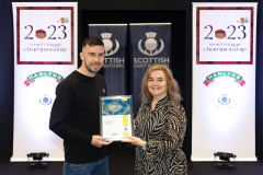 FREE TO USE PHOTOGRAPH..World Haggis Championships 2023.
Stewart Mackie who was awarded third place in the 2023 World Haggis Championships pictured receiving his certificate from Louise Harley from sponsors Hamlyns.
for further info please see press release from Maureen Young on 07778 779888
Picture by Graeme Hart.
Copyright Perthshire Picture Agency
Tel: 07990 594431