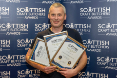 Scottish Craft Butchers Scottish Beef Slice Sausage Championship 2024 and Make It With Pork Championship 2024.
Andy Grant from John Stewart Quality Butchers Ltd; pictured with is Gold and Silver Awards
Picture by Graeme Hart.
Copyright Perthshire Picture Agency
Tel: 07990 594431