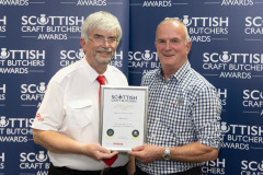 Scottish Craft Butchers Awards, Perth   23.05.24
Ian MacVicar (left) from sponsors Scotweigh pictured presenting Kenny Allan from HW Irvine butchers with his Gold Award in the Home Cured Bacon Product competition.
Picture by Graeme Hart.
Copyright Perthshire Picture Agency
Tel: 07990 594431