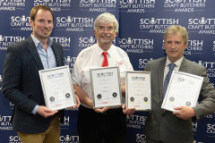 Scottish Craft Butchers Awards, Perth   23.05.24
Pete Mitchell (left) and Stewart Berry (right) from Puddledup pictured with Ian MacVicar from sponsors Scotweigh after winning silver and gold in the Home Cured Bacon Product competition.
Picture by Graeme Hart.
Copyright Perthshire Picture Agency
Tel: 07990 594431