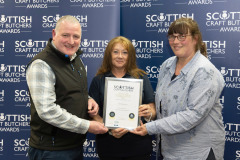 Scottish Craft Butchers Awards, Perth   23.05.24
Lynn Mills (centre) from sponsors Scobies Direct presenting Steven and Pamela Bennett of DH Robertson butchers in Arbroath with their certificate after being named Scottish Black Pudding Champions for the East of Scotland
Picture by Graeme Hart.
Copyright Perthshire Picture Agency
Tel: 07990 594431